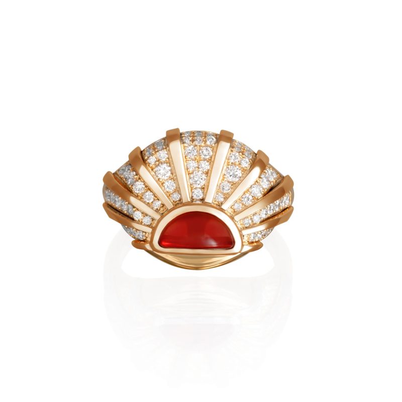 Sun Dawn Pinky, 18K gold sunburst pinky ring with 0.32 carats of white diamonds and a central deep red coral gemstone inspired by sunrise and 90s jewelry style.